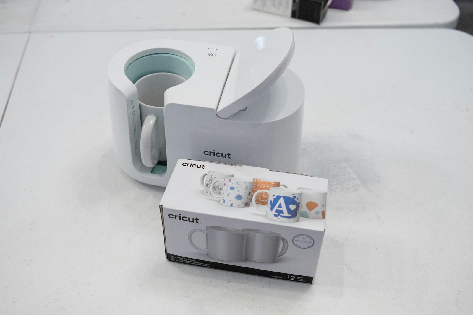 a close up of a box with a cup inside of it cricut heat press