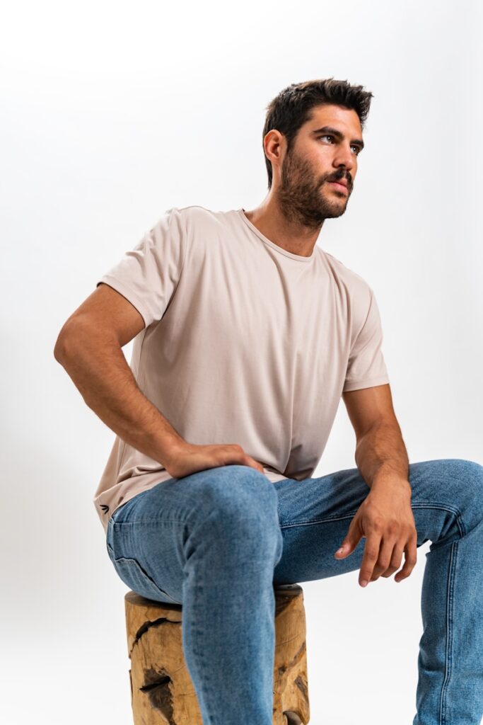 a man sitting on a stool