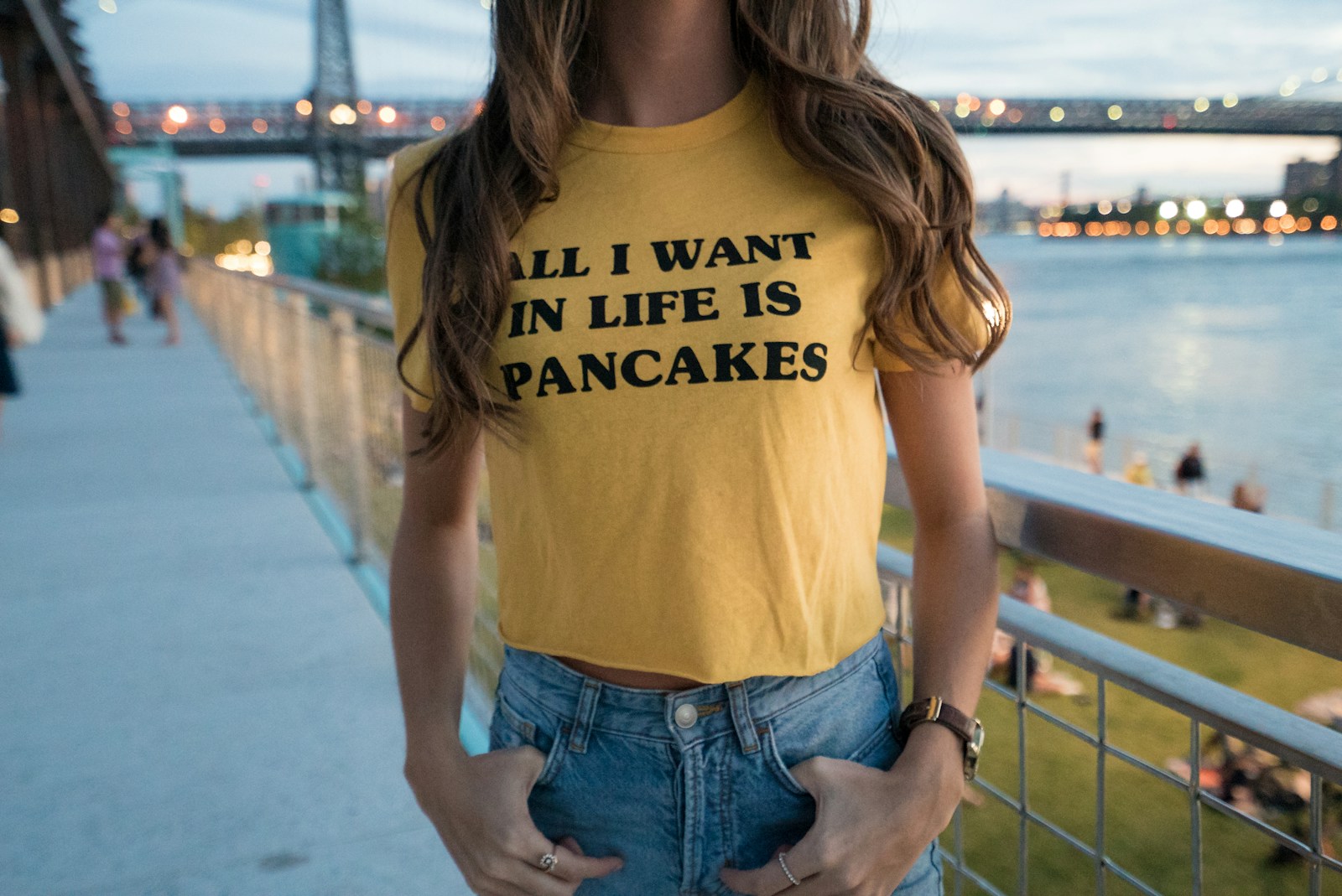 woman in yellow crew-neck t-shirt and blue denim bottoms funny shirts