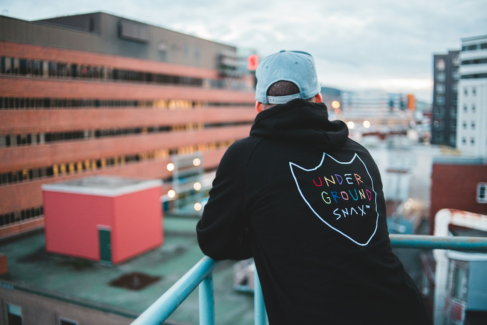 man in black hoodie wearing white and black cap (DTF Transfer) | Beginner’s Guide to Vibrant, Lasting Prints