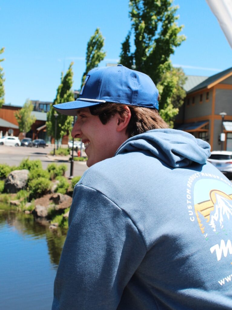 A man smiles while enjoying the view.