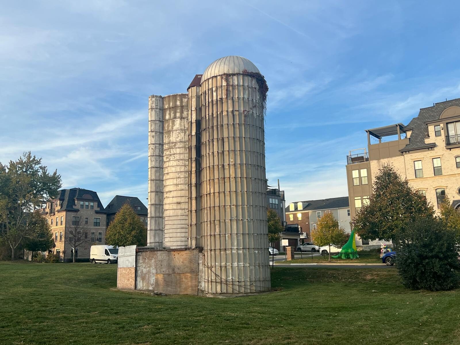 Photo by Erika Browne A vintage silo stands amid modern buildings and greenery in Gaithersburg, MD.