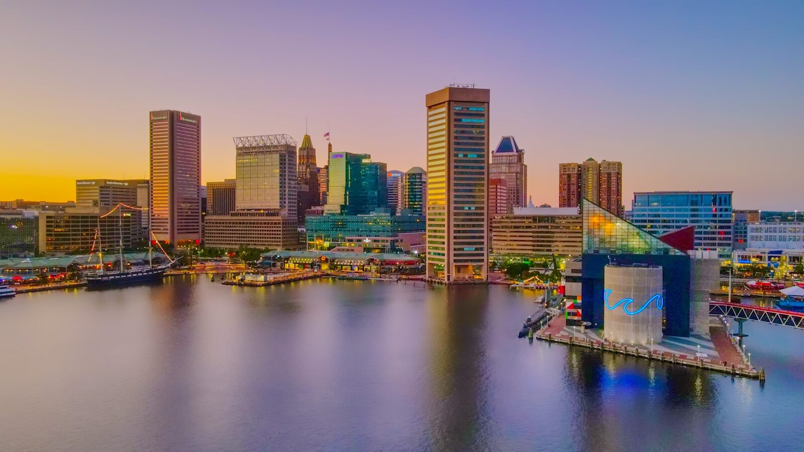 Photo by Brendan Beale city skyline across body of water during daytime