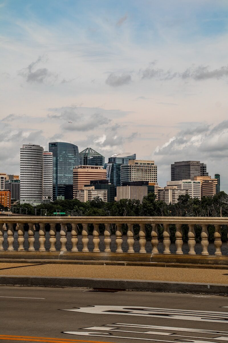a view of a city from across a bridge