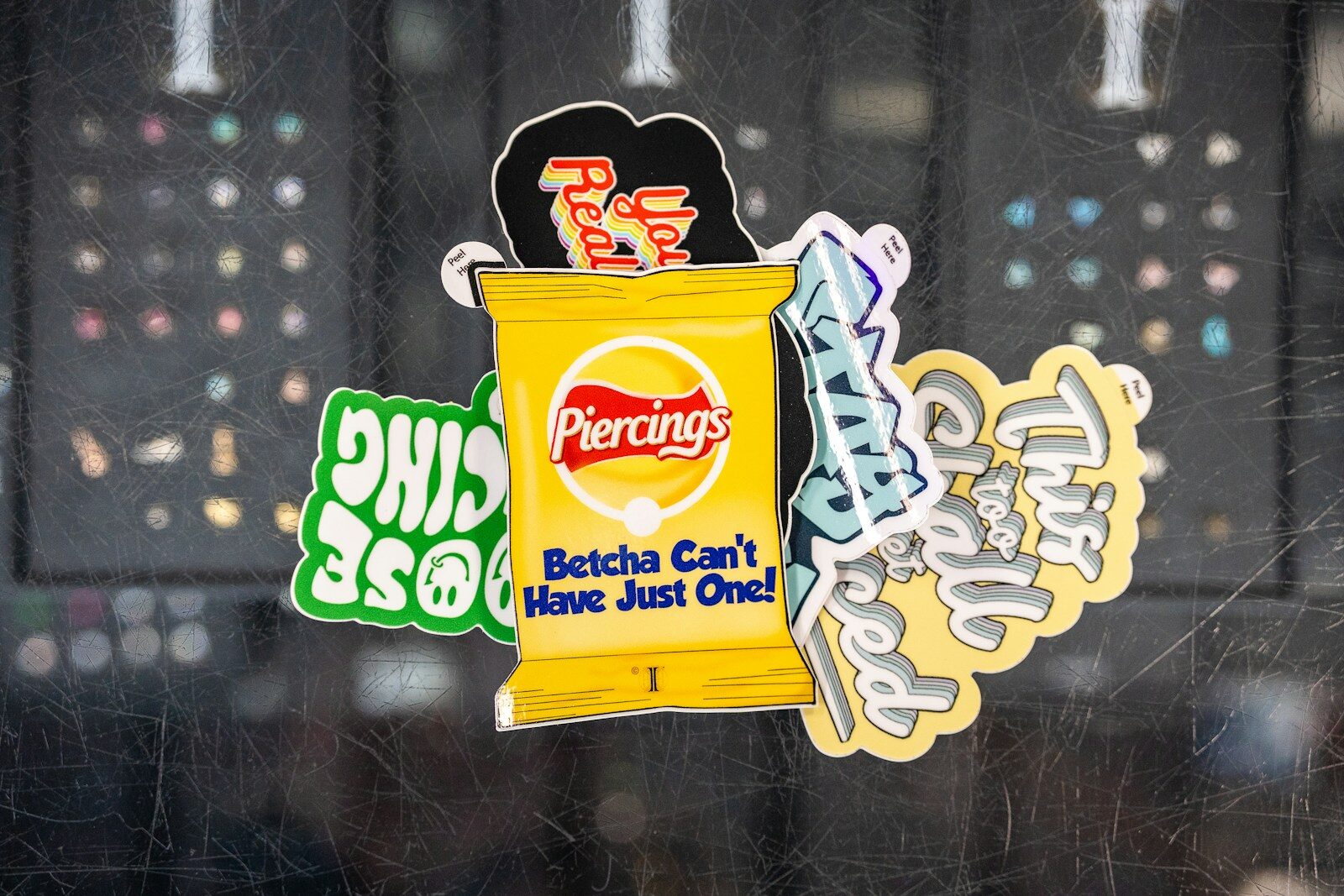 Assorted stickers including a potato chip bag design