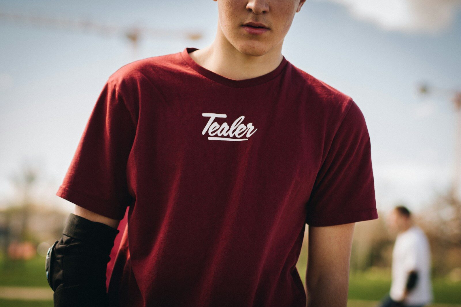 man in red crew-neck shirt under sunny sky Custom DTF Transfers Process: From Upload to Press (Step-by-Step)