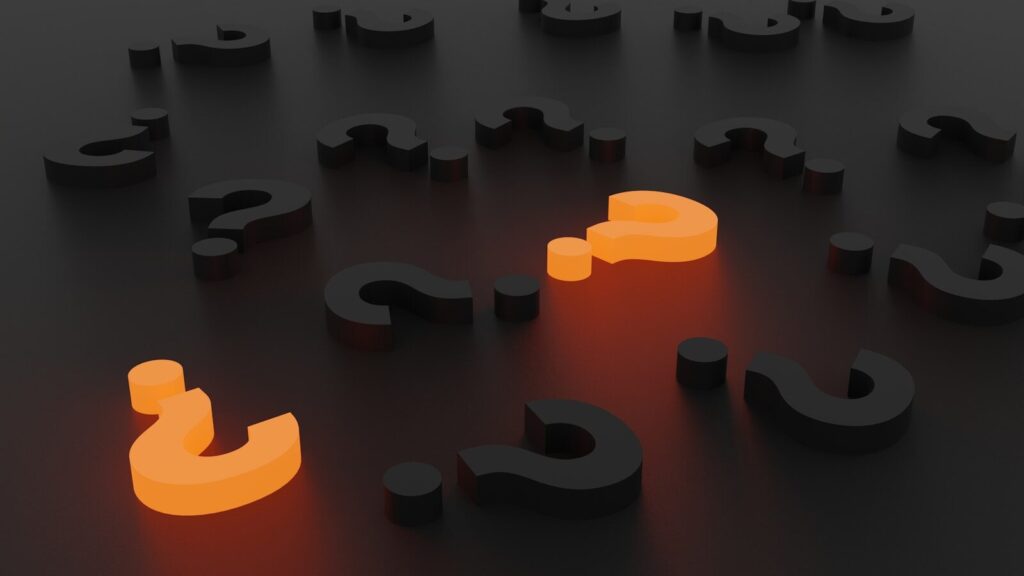3D rendered question marks in orange and gray