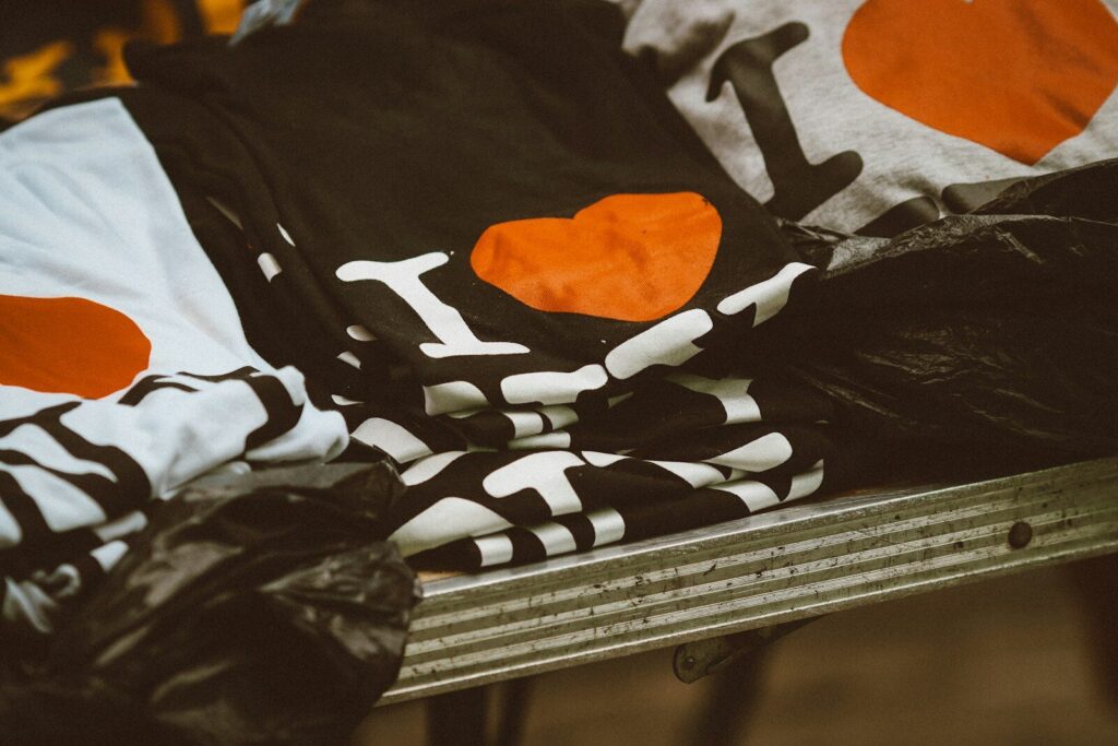 a pile of clothes sitting on top of a metal table
